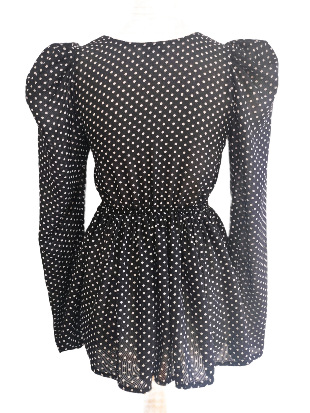 Niya black polka dotted top