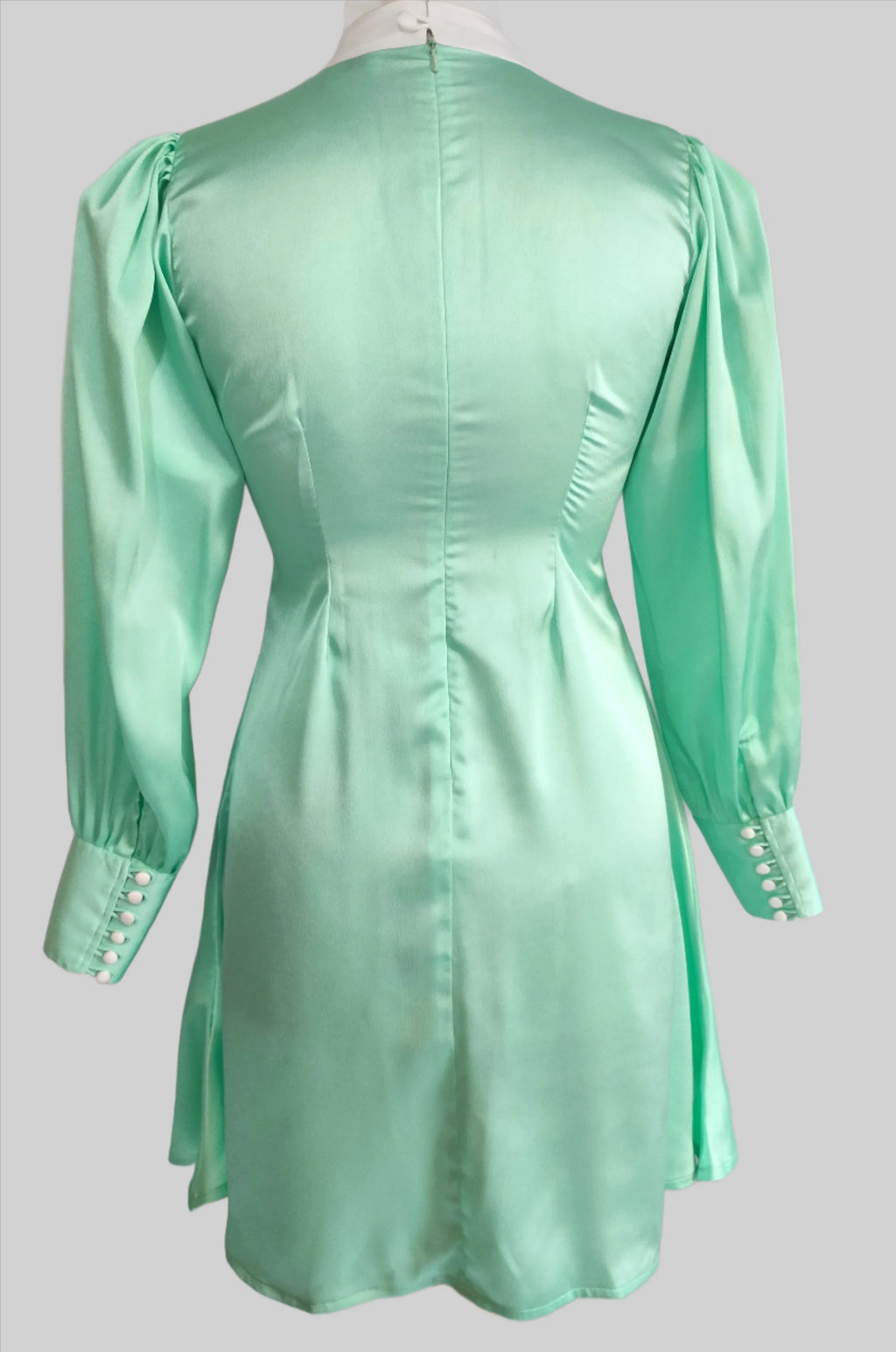 Jane aqua blue top with oversized bow