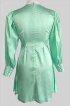 Jane aqua blue top with oversized bow