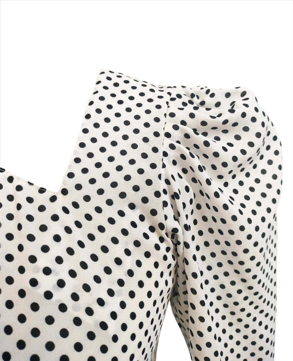 Niya white polka dotted top
