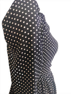 Niya black polka dotted top